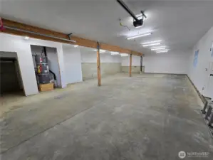 High efficiency water heater and storage under stairs.