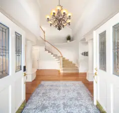 Enter into a majestic 18 foot foyer, light bright and sun drenched.