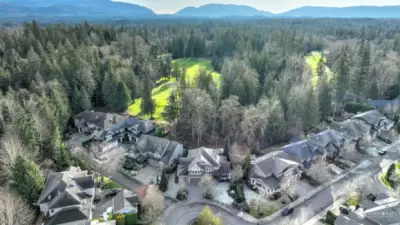 Situated in a quiet cul de sac location, the home backs up to the 7th green of the Plateau Golf Course and is located near 600 acres of trails in Soaring Eagle Park.