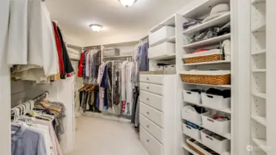 Primary closet designed by California Closets.