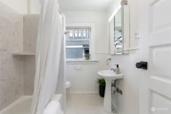 Main Floor Hall Bathroom w/ New Medicine Cabinet & Lighting