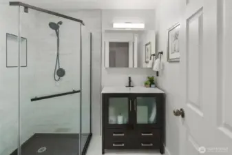 Primary bedroom with ensuite bathroom features a large shower for all your needs!