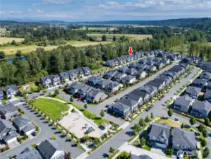 Birds eye view of Overlook at Riverfront community which features community parks, walking trails around the community, picnic areas and benches. This home has one of the larger lots and backs to a greenbelt with seasonal views of the Cascades (Winter time when the leaves have fallen off the trees).