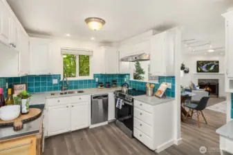 Enjoy new appliances and ample counterspace in handy kitchen
