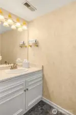 Half bath vanity with extra storage, full-sized mirror