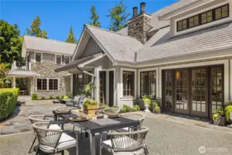 French doors open onto the flagstone patio for al fresco dining