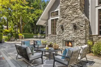 Enjoy relaxing next to the outdoor fireplace