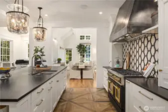 Custom cabinetry by Hewitt Cabinets plus Indian Stone honed granite countertops