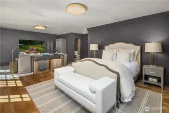 Spacious guest suite features custom draperies, a seating area and a walk-in closet
