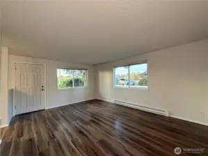 Unit 107 - Open living area with lots of natural light.