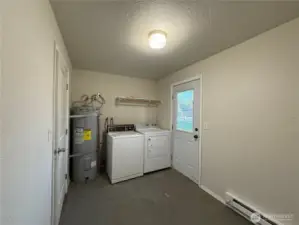 Unit 107 Laundry room new water heater 2021 & New dryer 2024