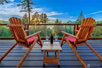 Old-Growth Cedar Exterior with Ocean Views – Charming log home façade framed by sweeping views over the Salish Sea