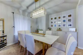 Beautiful dining room with inset ceiling and custom cabinets by Closets by Design + new light fixture.