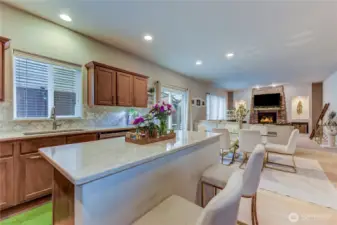 Fabulous Chef's Kitchen with quartz counters opens to the large family room.