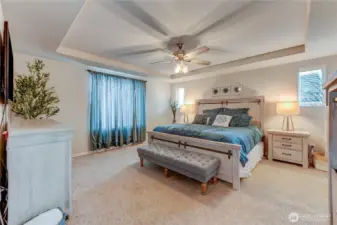 Large primary suite with owner added ceiling fan/light.