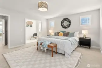 Primary bedroom featuring large nook, 5-piece bath, built-in speakers, and walk-in closet.