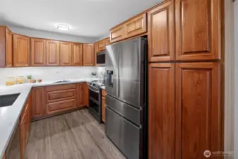 Tons of storage cabinets, including the pantry!