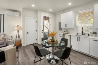 Imagine evenings gathered here, dinner simmering nearby, laughter echoing through a space designed for connection.