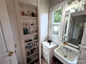 Main floor bathroom with shower & built in medicine cabinet