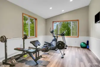 Finished exercise room adjacent to garage, 280 additional sq ft.