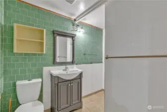Fun color scheme in this 3/4 bath. Shower just behind this wall.