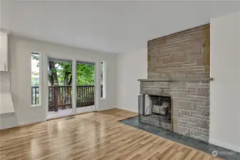 Yep, that's the original wood burning corner fireplace. Enjoy a cozy fire while having dinner and enjoying your view of the trees.