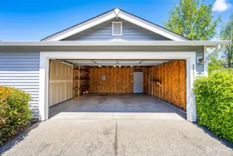 This is a spacious two-car garage with an automatic door.