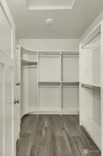 Primary bedroom walk-in closet