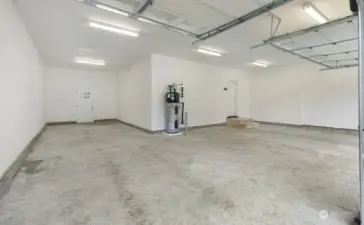 Four car garage with high efficiency hot water tank