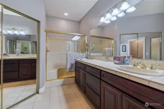 The Discovery has one walk-in closet and a double reach in closet. Dual sink vanity, step-in shower and private water closet.