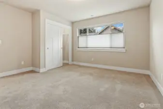 This is the first of four bedrooms on the upper level of this beautiful home.  Top-down/bottom/up shades in every room.