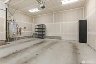 Huge two car garage with extra room for storage.