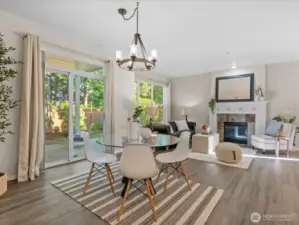 Dining area opens to partially covered patio for year-round entertaining indoors or out.