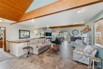 Spacious and open living spaces with views of Burrows Bay and the marina.