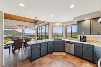 Enjoy the beautiful views as you prep and clean in this stunning kitchen.