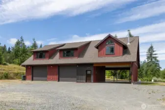 No detail was spared in the construction of this home. The expansive driveway and parking area easily accommodate multiple vehicles, with ample space for turning around. The oversized carport features striking exposed beams, 50-amp electrical service, and an abundance of ceiling lighting—perfect for functionality.