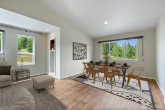Every window in the home captures the beautiful territorial views, bringing the outdoors in. The open-concept layout offers versatility and generous space, perfect for entertaining family and friends.