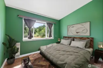 Bedroom #1 features beautiful territorial views, a spacious closet, and a mini-split system for heating and air conditioning.