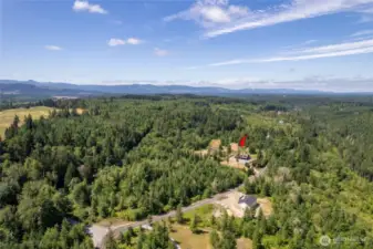 Set on 20.6 acres of land, this property offers ample space to explore, enjoy, and truly make your own private retreat.