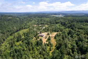 Set on over 20 acres, this expansive property boasts a breathtaking forest reserve, access to serene lakes, picturesque trails, and abundant wildlife—an ideal retreat for nature lovers and outdoor enthusiasts.