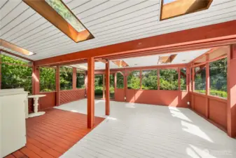 Rear covered porch with wrap around decking-adjacent to kitchen