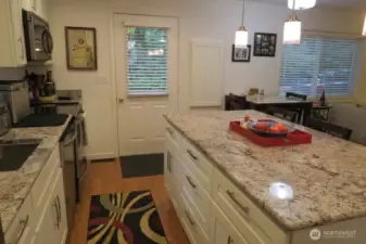 Kitchen with lots of storage drawers and pull out shelves.