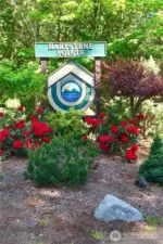 Hartstene Pointe Gate sign.  Find more about us at:  www.hpma.org  Realtors are to stay with buyers inside gate.