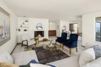 One of three living rooms in the home, each with its own fireplace.