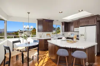 Space for an eating nook off the kitchen, as well as room for bar stools at the island.