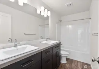Third full bath, located upstairs.