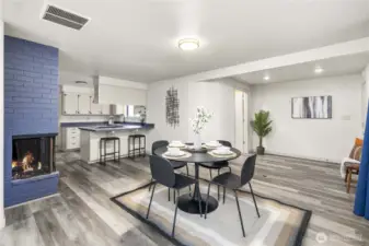 The 3/4 bathroom is located behind the curved wall.