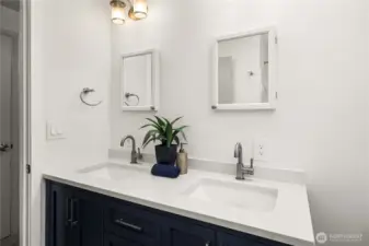 Main bathroom sinks near bedrooms