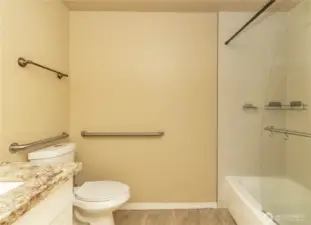 Remodeled bathroom with granite countertop