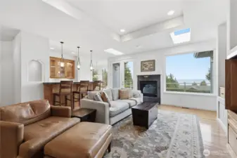 Comfortable living room with propane fireplace and amazing light.